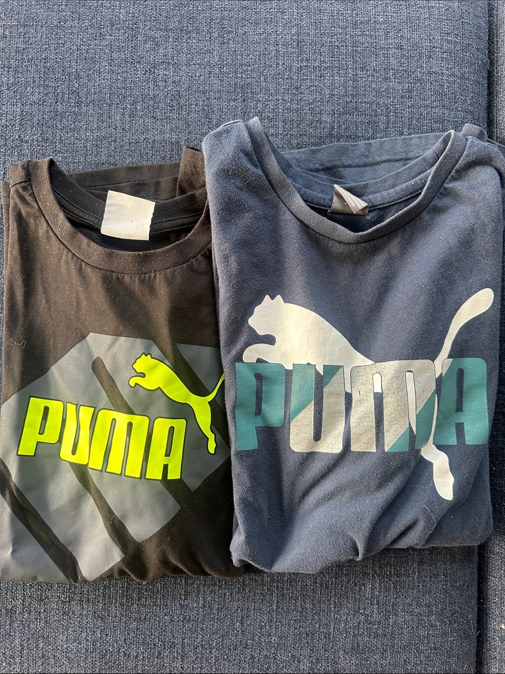 Puma Kids Short Sleeve Tees in Black & Navy with Neon Yellow and Teal Logos